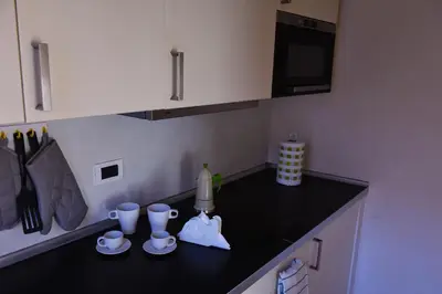 Cucina o angolo cottura di 4YOU APARTMENTS - PONTI ROMANI