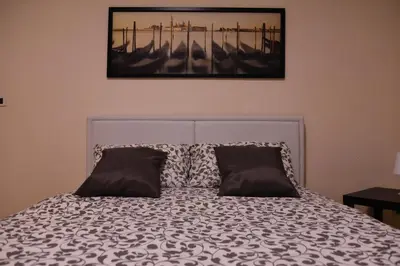 Letto o letti in una camera di 4YOU APARTMENTS - PONTI ROMANI