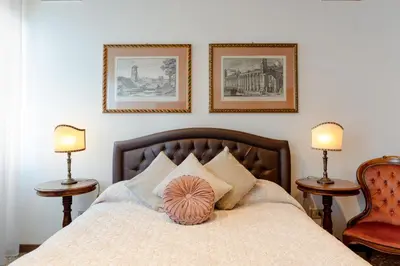 Letto o letti in una camera di Ca' Santo Spirito B&B
