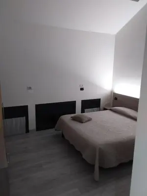 Letto o letti in una camera di Hotel Alle Scuole NEW