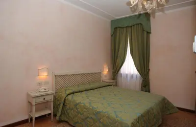 Letto o letti in una camera di Casa Mimma
