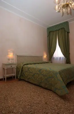 Letto o letti in una camera di Casa Mimma