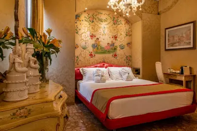 Letto o letti in una camera di Hotel Santo Stefano
