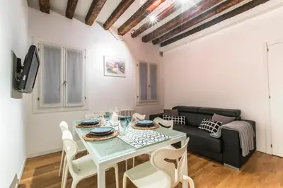 Area soggiorno di Arsenale Design Apartment R&R
