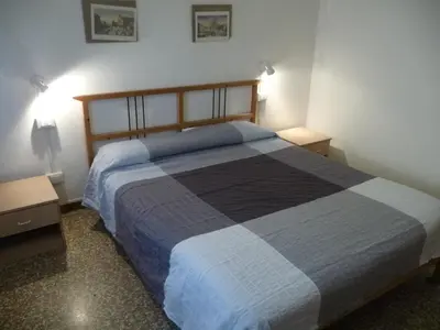 Letto o letti in una camera di Appartamento Daniele