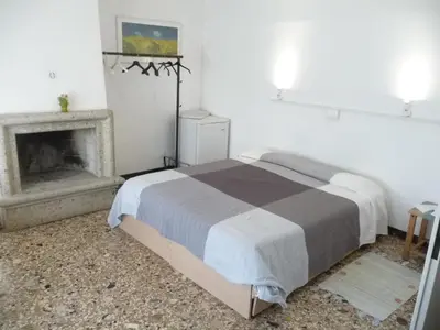 Letto o letti in una camera di Appartamento Daniele