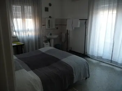 Letto o letti in una camera di Appartamento Daniele