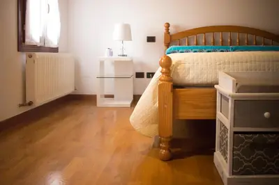 Letto o letti in una camera di Ca' Natalìa
