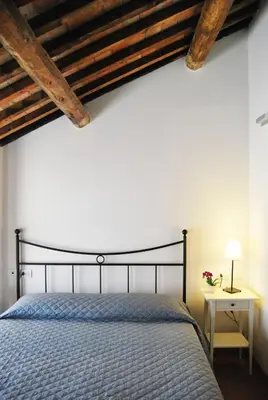 Letto o letti in una camera di Burro e Marmellata