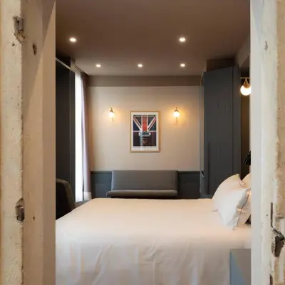 Letto o letti in una camera di The Glam Boutique Hotel & Apt