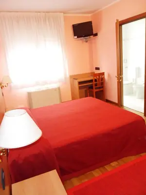 Letto o letti in una camera di Hotel Ristorante Al Bassanello