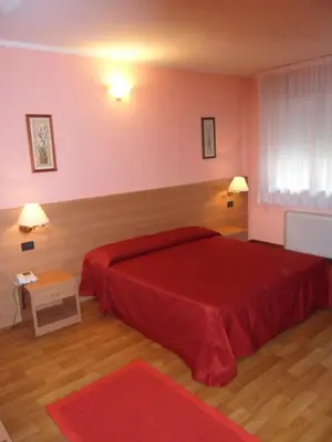 Letto o letti in una camera di Hotel Ristorante Al Bassanello