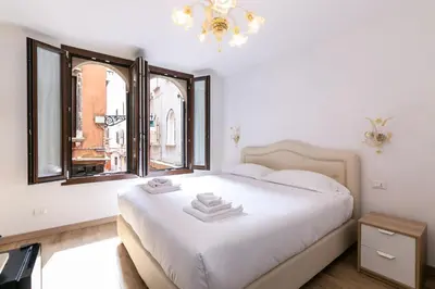 Letto o letti in una camera di Rialto Suite 707
