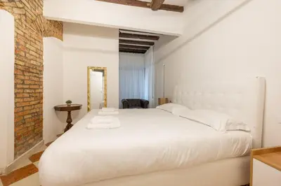 Letto o letti in una camera di Rialto Suite 707