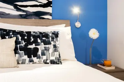 Letto o letti in una camera di Lovely Corner: Perfect to visit Treviso/Venezia