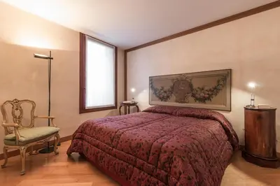 Letto o letti in una camera di Fenice Double Canal view by LionHost