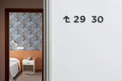 Letto o letti in una camera di Hotel Rosa