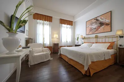 Letto o letti in una camera di Terme Preistoriche Resort & Spa