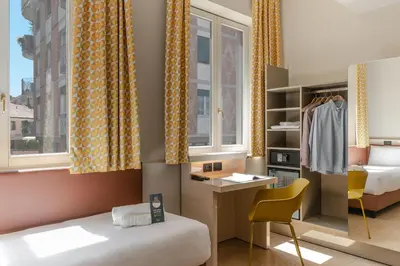 Letto o letti in una camera di B&B Hotel Treviso