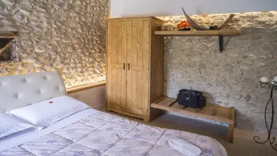 Letto o letti in una camera di B&B Agli Angeli