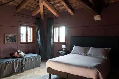 Letto o letti in una camera di Hotel 5 Colonne