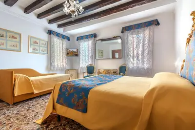 Letto o letti in una camera di Hotel Casa Boccassini