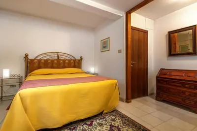 Letto o letti in una camera di Hotel Casa Boccassini
