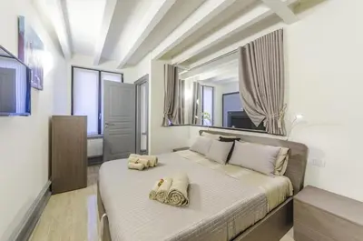 Letto o letti in una camera di Venice Residence