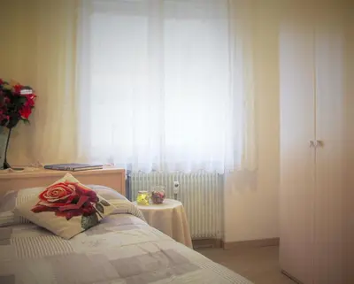 Letto o letti in una camera di Bed & Breakfast Delle Rose