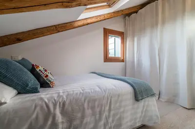 Letto o letti in una camera di Rialto Mini