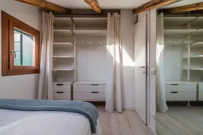 Letto o letti in una camera di Rialto Mini