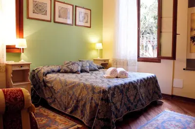 Letto o letti in una camera di San Gervasio Apartment
