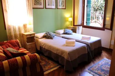 Letto o letti in una camera di San Gervasio Apartment