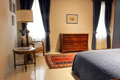 Letto o letti in una camera di Sarai Apartments