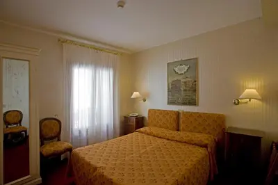 Letto o letti in una camera di Hotel Agli Alboretti
