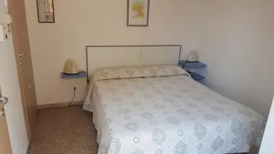 Letto o letti in una camera di Hotel Bellaria