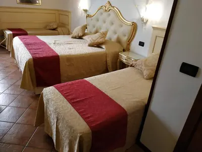 Letto o letti in una camera di Alloggi SS Giovanni e Paolo
