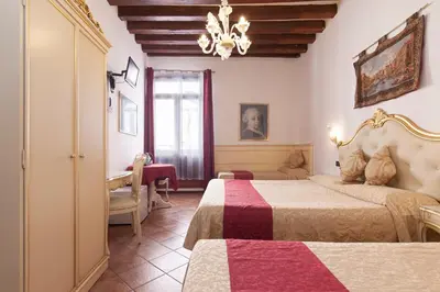 Letto o letti in una camera di Alloggi SS Giovanni e Paolo