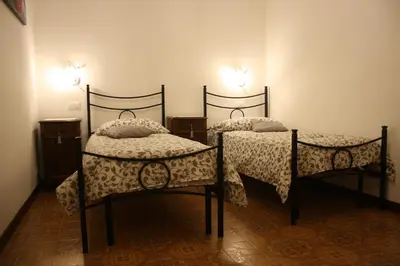 Letto o letti in una camera di Ca' ARiANna