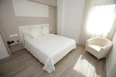 Letto o letti in una camera di Hotel Europa