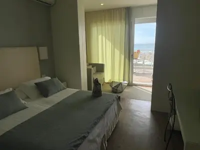 Letto o letti in una camera di Hotel Ril