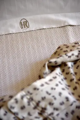 Letto o letti in una camera di Hotel Ril