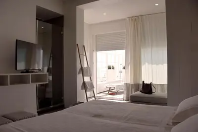 Letto o letti in una camera di Hotel Ril