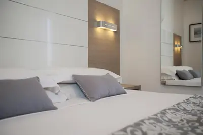 Letto o letti in una camera di Hotel Imperial Palace