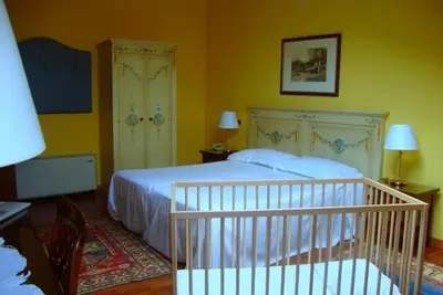 Letto o letti in una camera di Hotel La Loggia