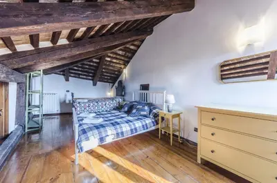 Letto o letti in una camera di Maurizio House - near the Train Station