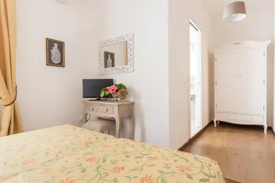 Letto o letti in una camera di B&B La Bragadina