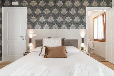 Letto o letti in una camera di Hotel Grifoni
