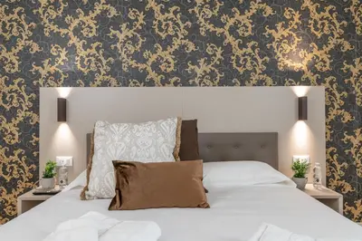 Letto o letti in una camera di Hotel Grifoni