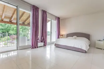 Letto o letti in una camera di Pool & Garden Villa Lelia